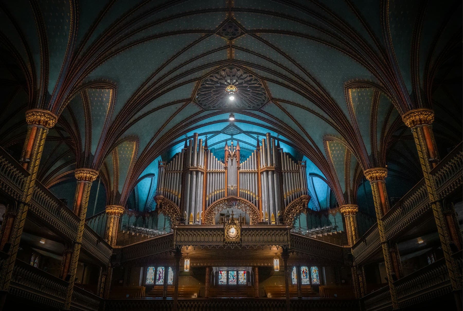 Organ loft gallery, pipes, long table, looking down