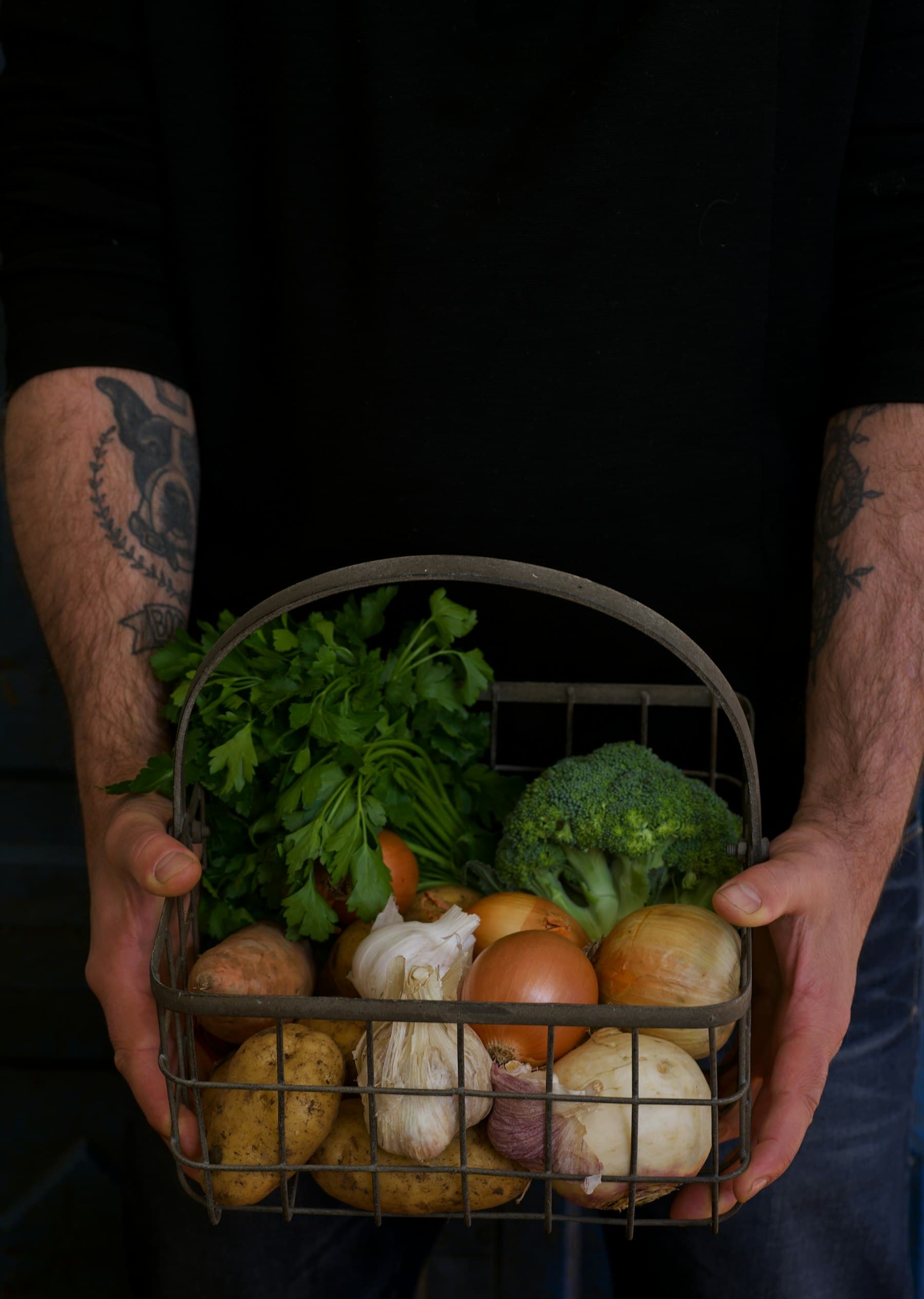 Hands holding produce from the farm