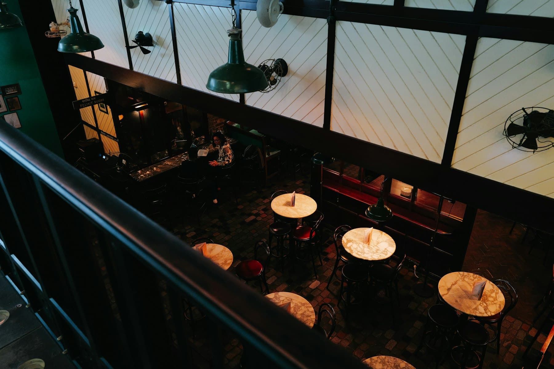 Dining room from the organ loft, wide, low light