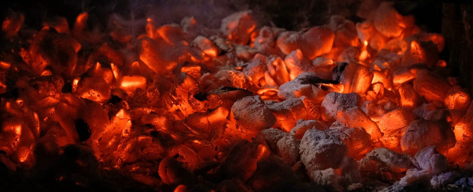 The open hearth, embers, cast iron, night