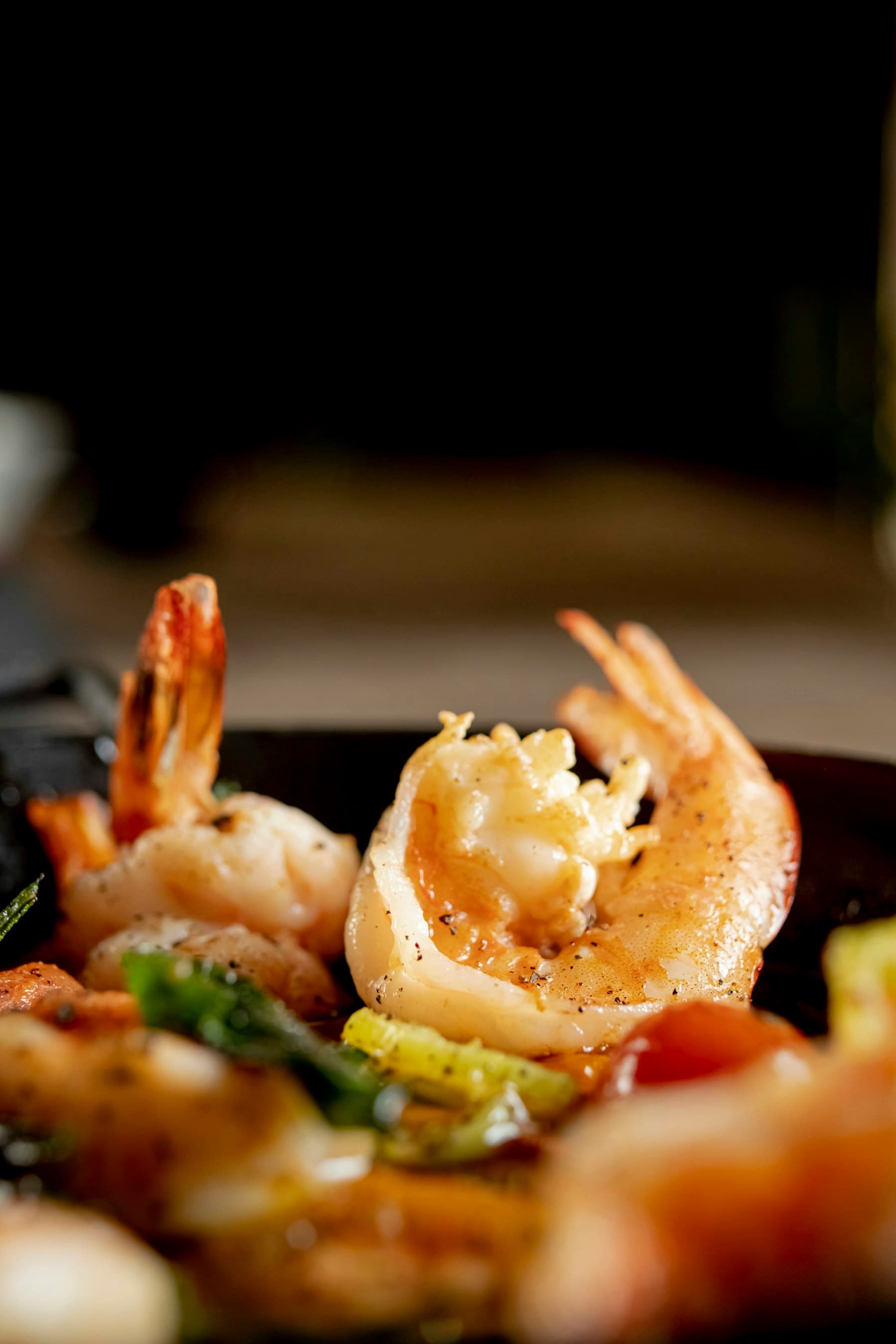 Langoustine, orange pumpkin glaze, dark ceramic